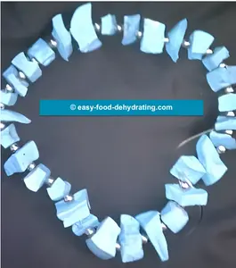 Make a dehydrated potato-beaded necklace like Janetta: dry, paint, seal, and string rock-hard potato beads.