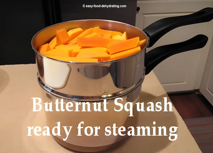 Butternut Squash in steamer-pan, ready for steaming Butternut Squash in steamer-pan, ready for steaming
