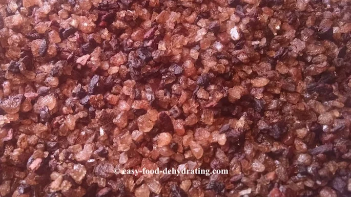 Closeup shot of Julie's Smoked Garlic Salt, ready to be mixed with fine sea salt