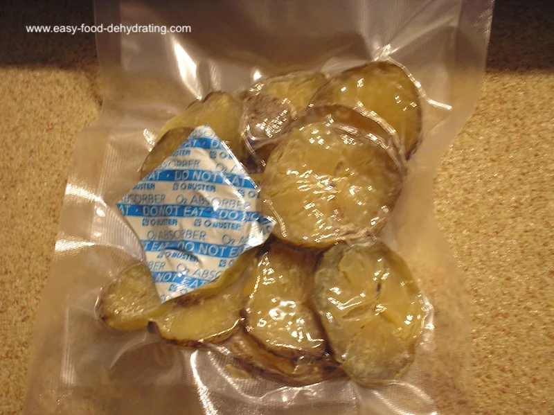 Dehydrated sliced potatoes, vacuum sealed with an oxygen absorber Dehydrated sliced potatoes, vacuum sealed with an oxygen absorber