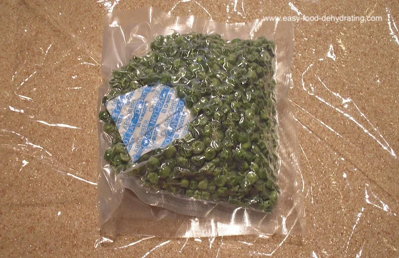 Dehydrated peas in a food vacuum -sealer bag with a 100cc oxygen absorber.