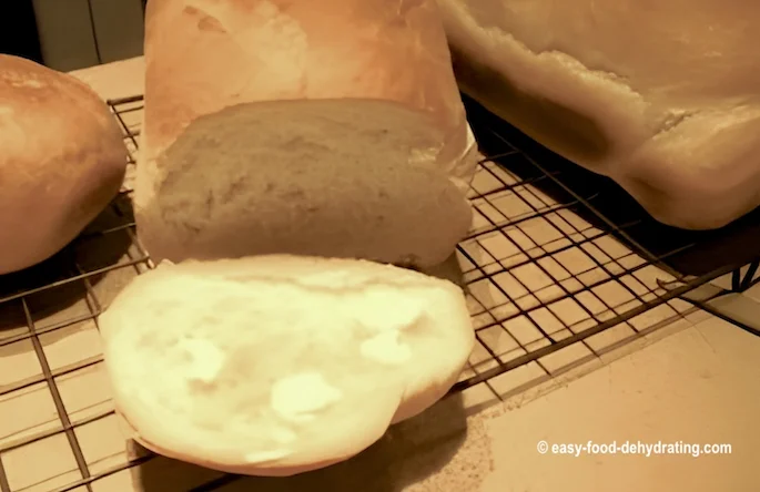 Try this Beginner Bread recipe to make baked mouthwatering bread! Home Baked Bread cooling on a wire rack
