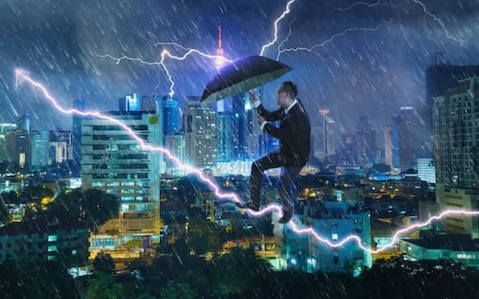 man in a storm with an umbrella man in a storm with an umbrella