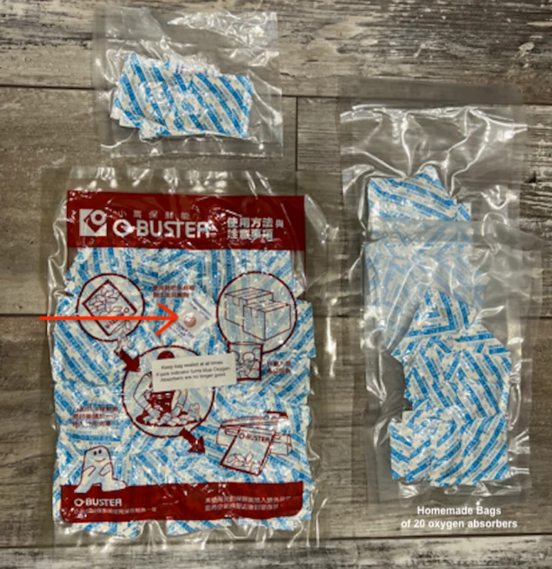 Unopened 100cc oxygen absorbers pack alongside homemade 20-packs vacuum sealed for freshness