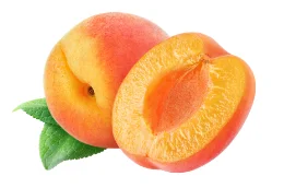 Whole and halved peaches with pit