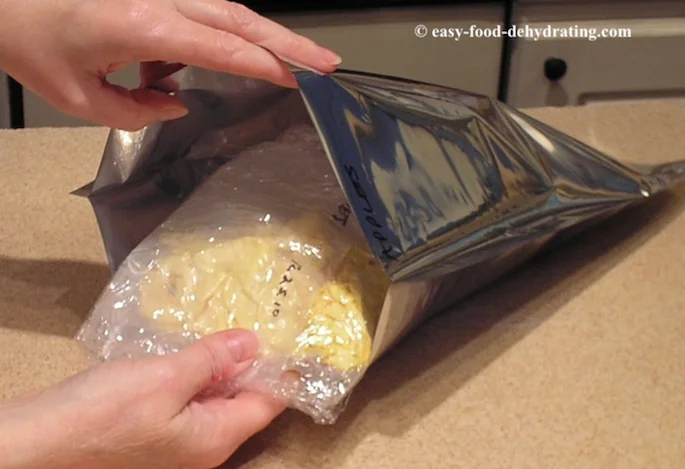 Putting vacuum-sealed packages inside Mylar bag Putting vacuum-sealed packages inside Mylar bag