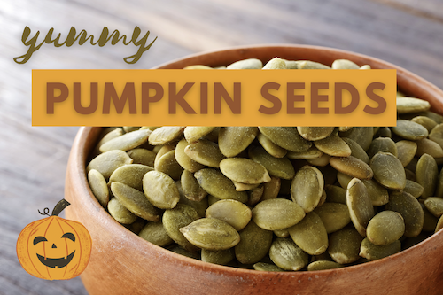 Pumpkin seeds in a wooden bowl
