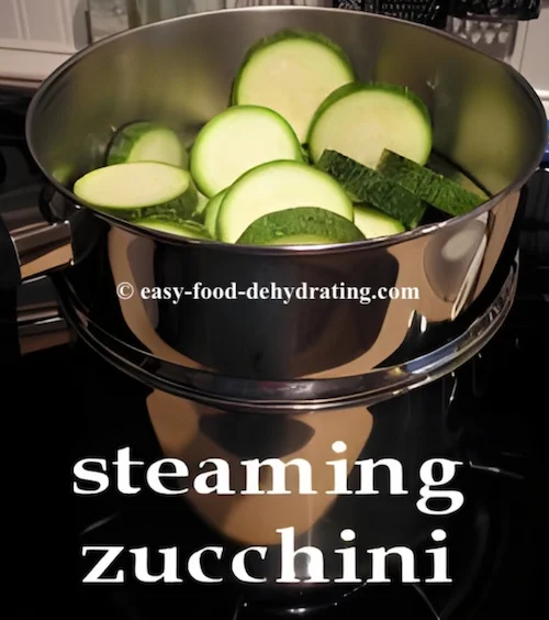 steaming sliced zucchini steaming sliced zucchini