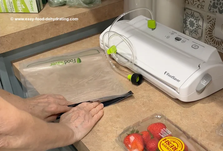 Vacuuming sealing strawberries using reusable bags Vacuuming sealing strawberries using reusable bags